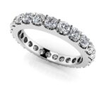 This beautiful shared prong diamond eternity ring offers a unique prong setting
