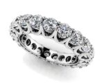 This beautiful Unique Shared Prong Diamond Eternity ring does a wonderful job at showcasing the luminous diamonds.
